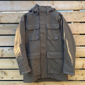 BRAND NEW Helly Hansen jacket dark khaki large. With 5 pockets military style.